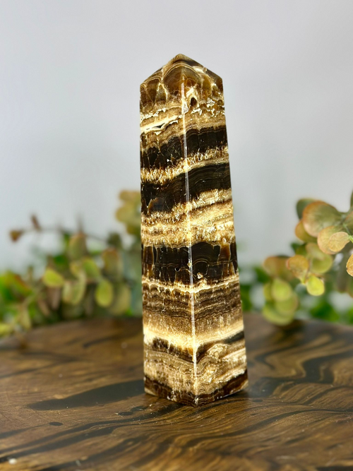 Polished 289g Chocolate Calcite tower showing intricate natural layered patterns