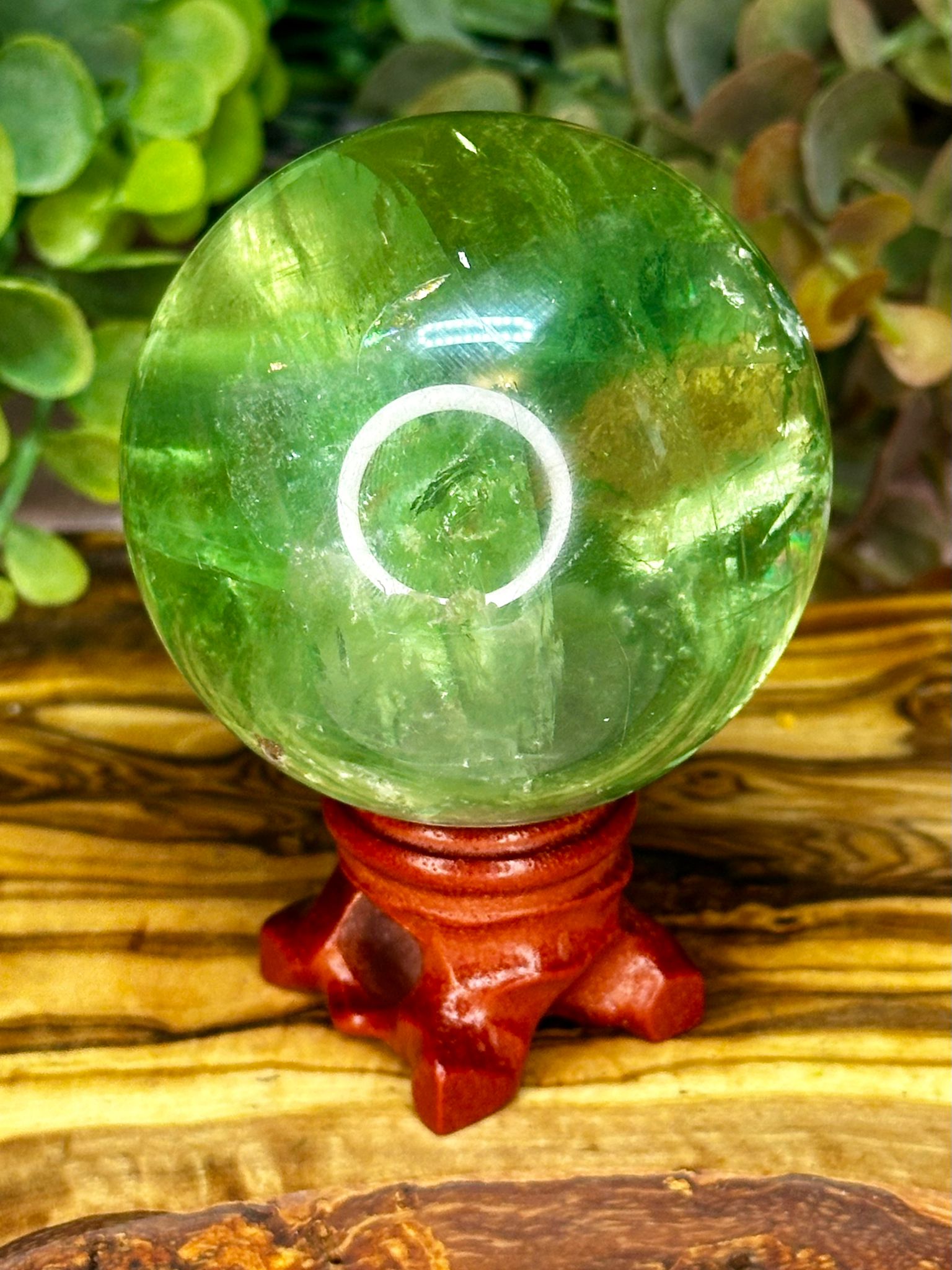 Apple Green Fluorite Sphere with Rainbows & Pyrite Inclusion