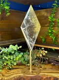 Large Golden Rutilated Quartz Diamond on Display Stand