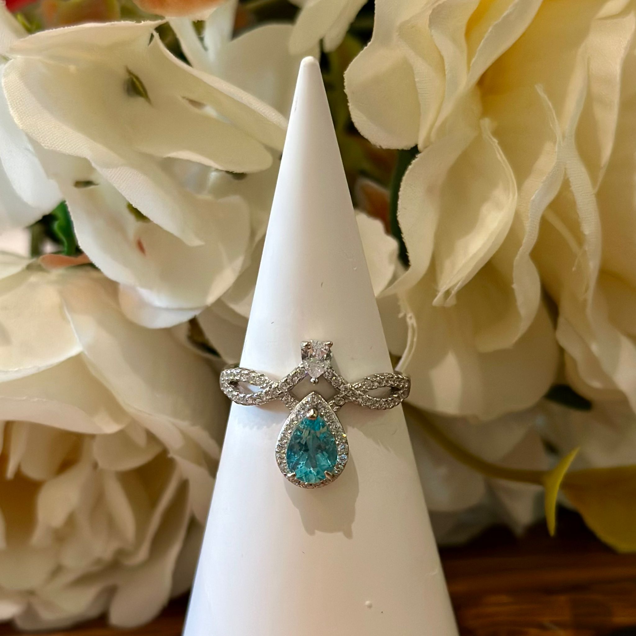 Blue Topaz Ring – Teardrop Halo with Infinity Band