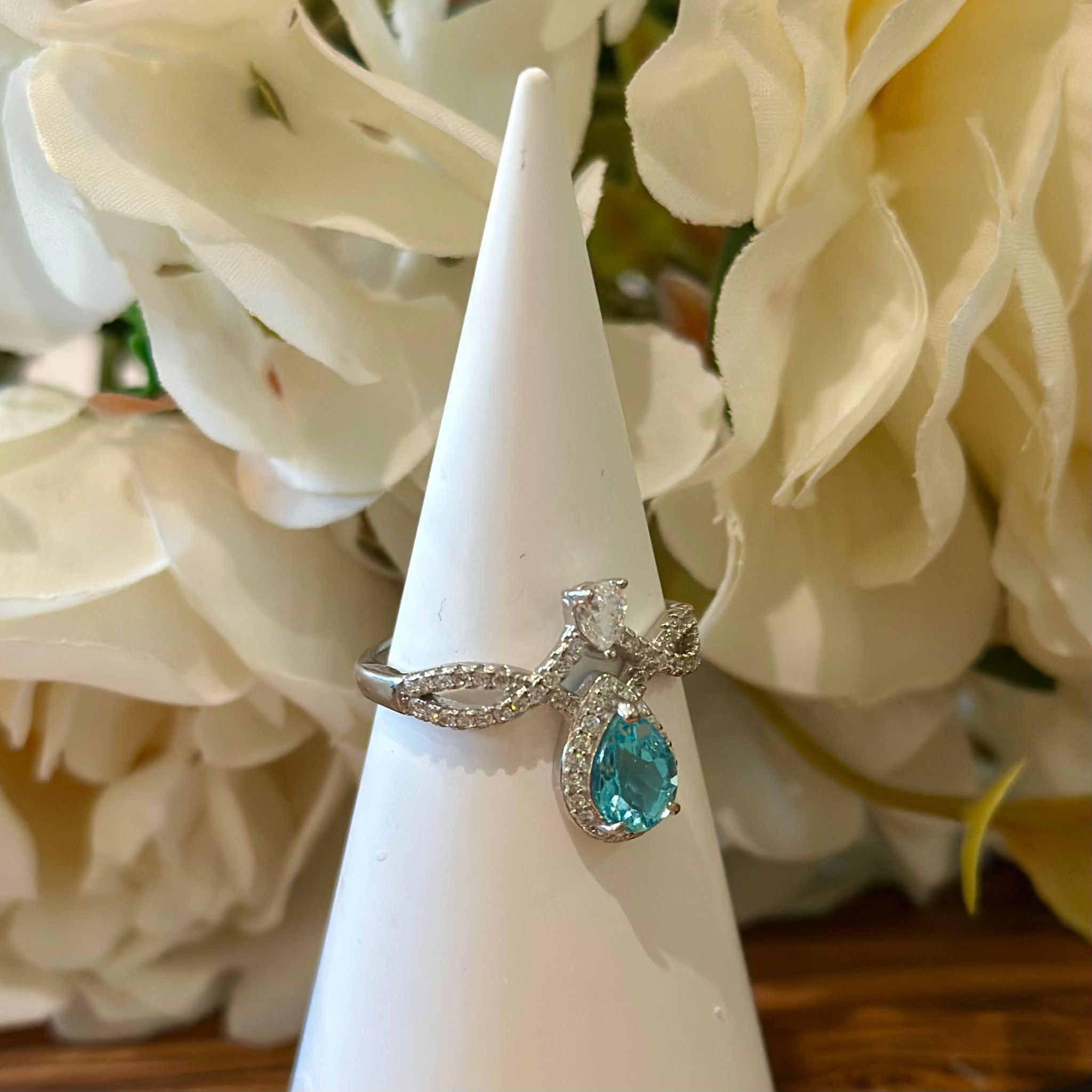 Blue Topaz Ring – Teardrop Halo with Infinity Band