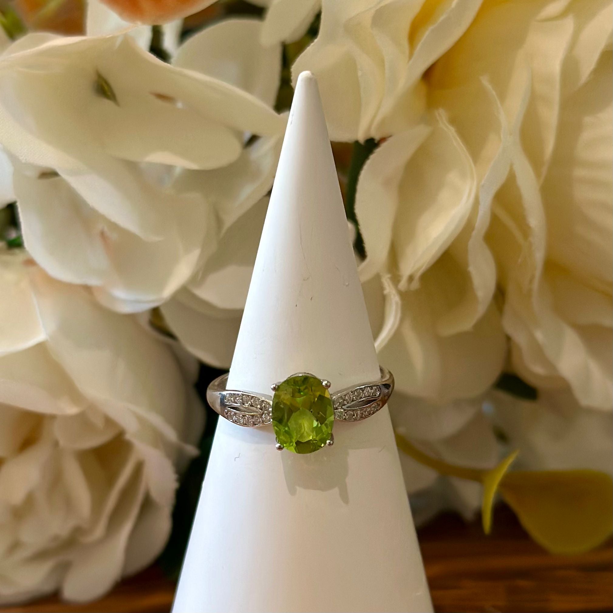 Peridot Ring – Oval Cut with Pavé Leaf Band