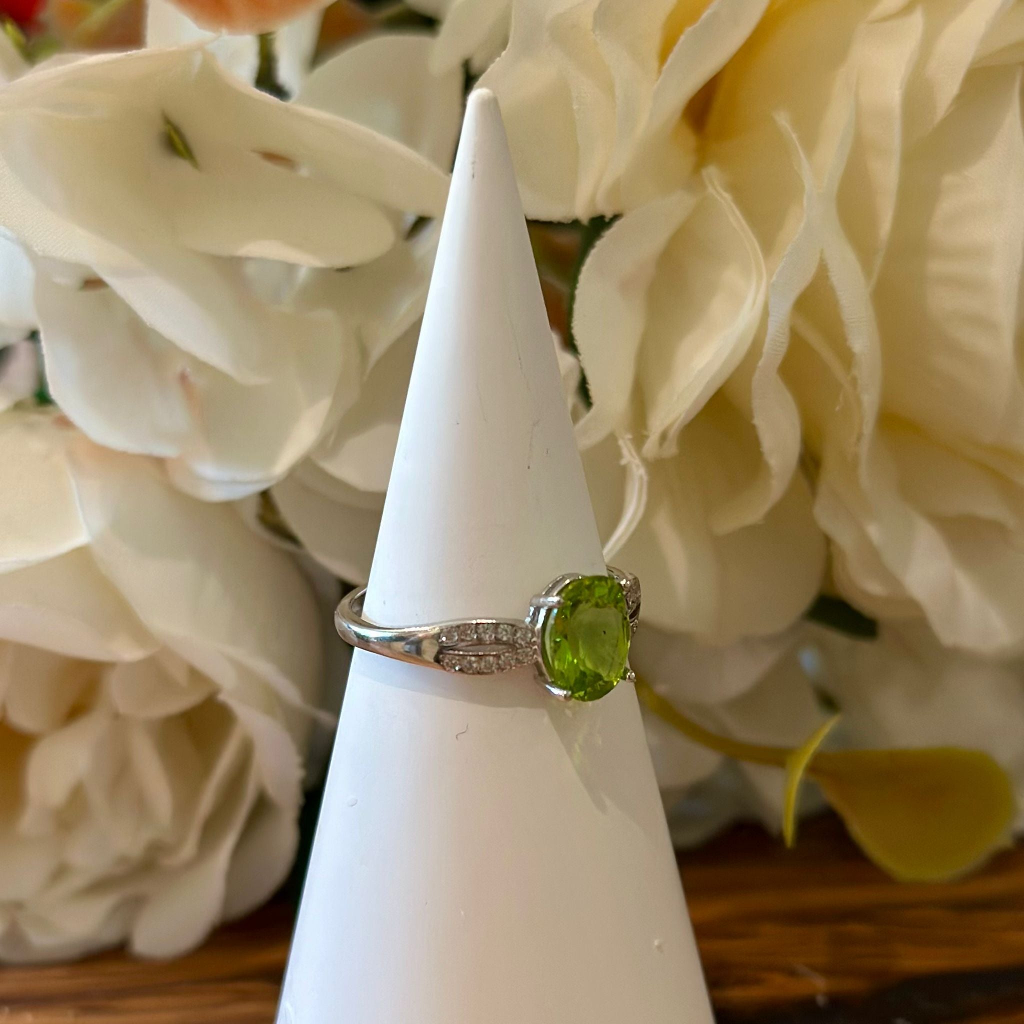 Peridot Ring – Oval Cut with Pavé Leaf Band