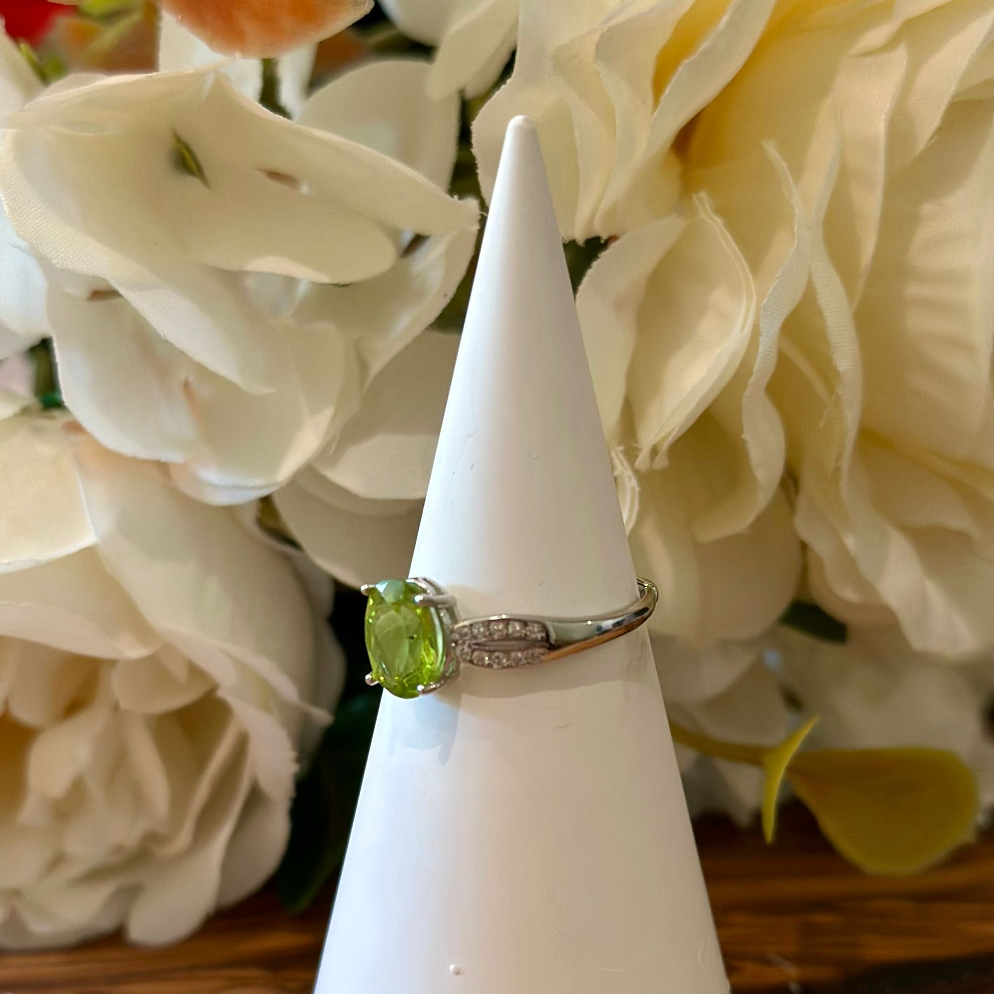 Peridot Ring – Oval Cut with Pavé Leaf Band