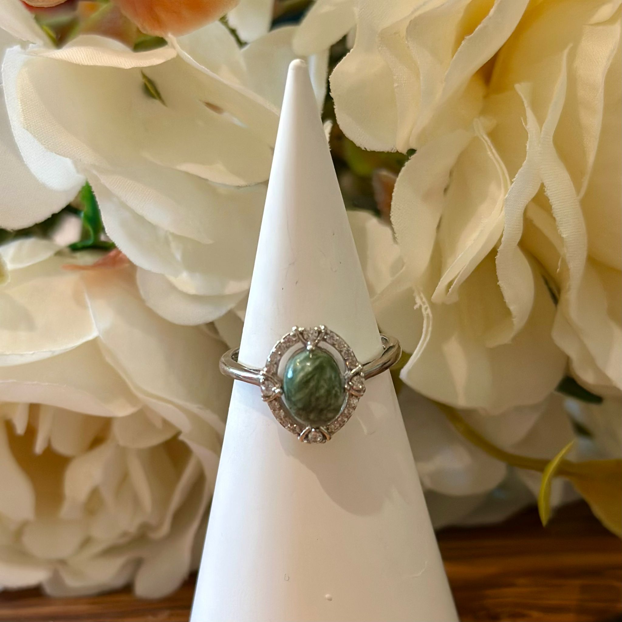 Seraphinite Ring – Soft Green Cabochon with Halo Setting