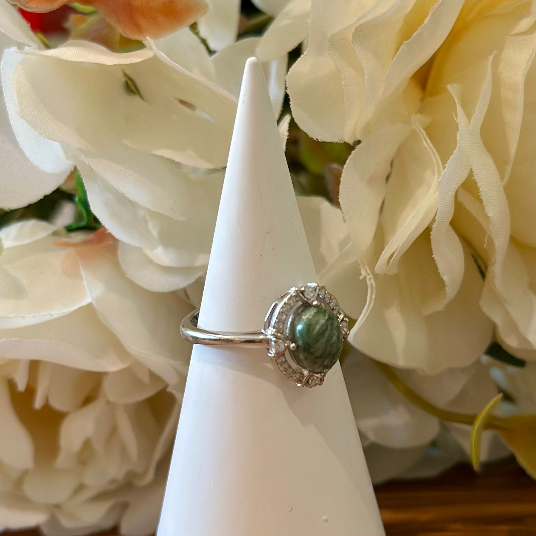 Seraphinite Ring – Soft Green Cabochon with Halo Setting