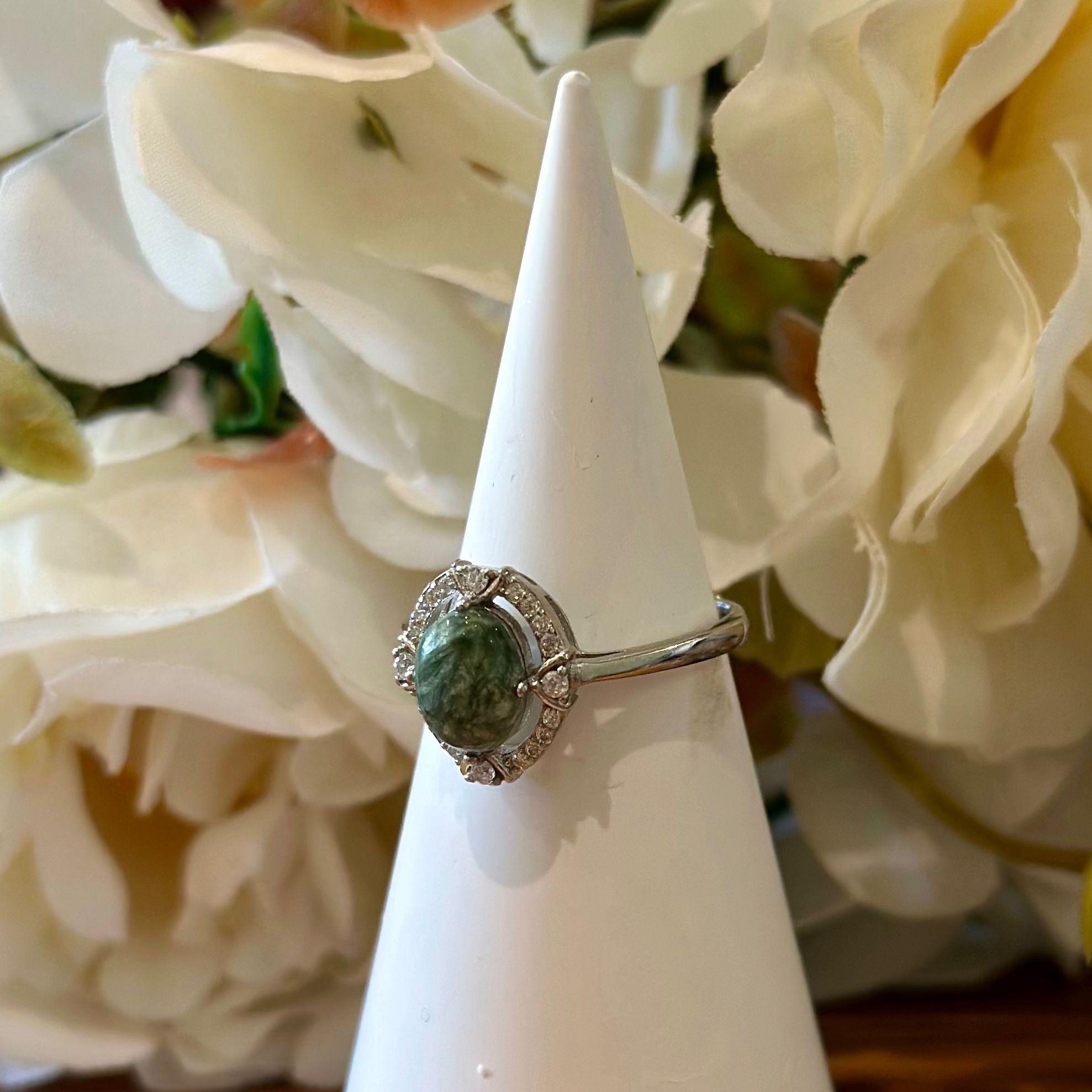 Seraphinite Ring – Soft Green Cabochon with Halo Setting