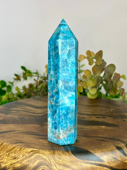 Vivid Blue Apatite crystal tower with turquoise blue colouring and natural internal patterns.