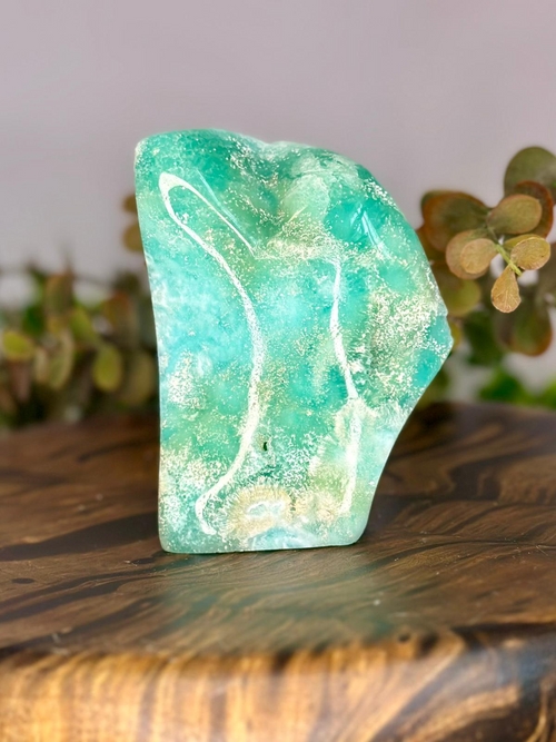 Polished Blue Aragonite freeform with vibrant turquoise colouring and natural white patterning