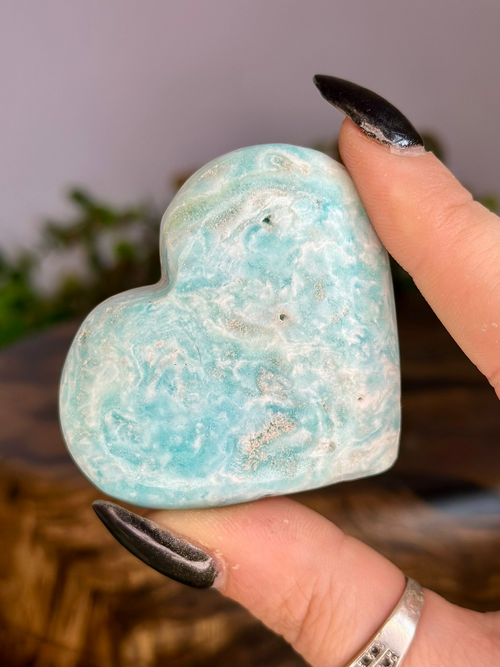 Polished Blue Aragonite heart with aqua blue colouring, soft white marbling and natural swirling patterns