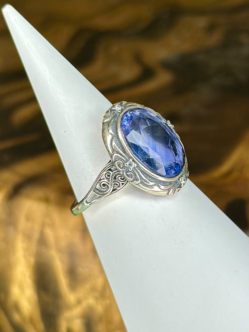 Side view of Blue Fluorite statement ring with ornate silver-tone setting