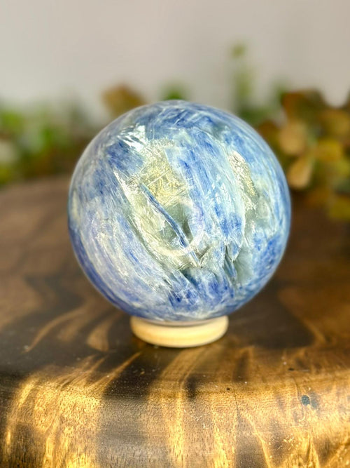 544g Blue Kyanite and Mica sphere showing layered blue Kyanite blades and bright reflective Mica