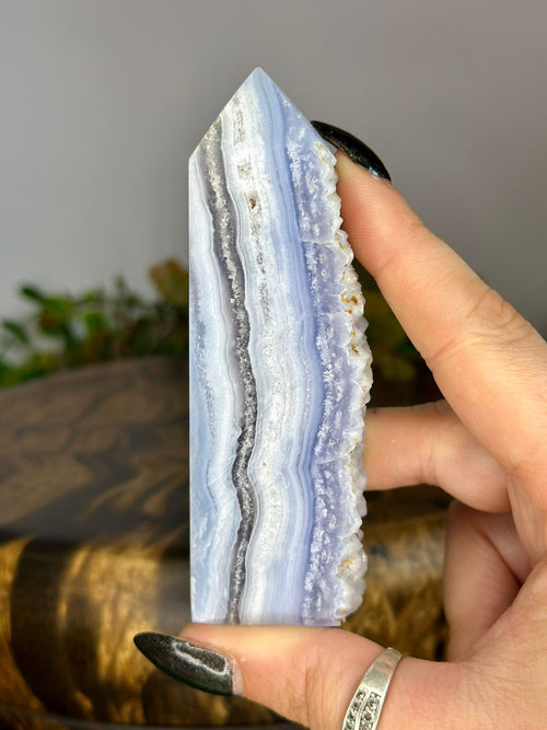 Large Blue Lace Agate druzy tower with pale blue banding and natural crystal edge