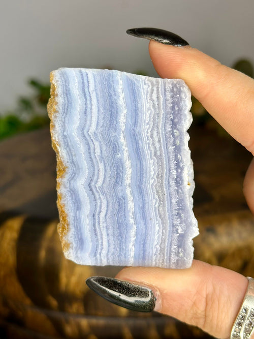 Blue Lace Agate slice with delicate pale blue and white natural banding