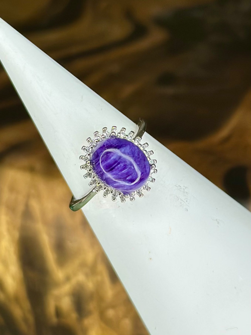 Front view of oval Charoite S925 silver ring showing vivid purple, violet and lilac swirling gemstone pattern