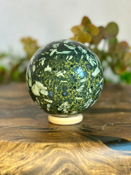 7cm Chrysanthemum Stone sphere showing natural floral mineral patterns and mossy green colouring