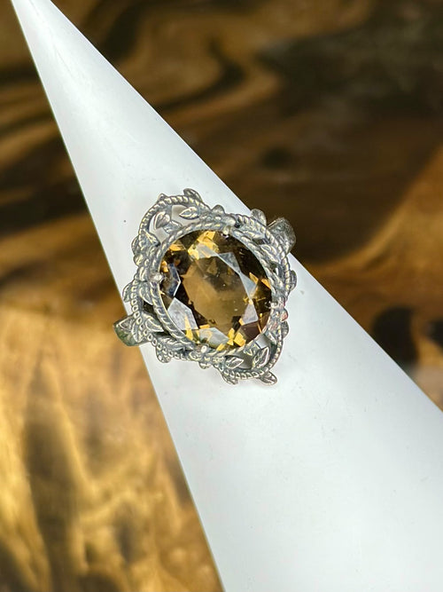 Citrine botanical statement ring with faceted golden oval crystal