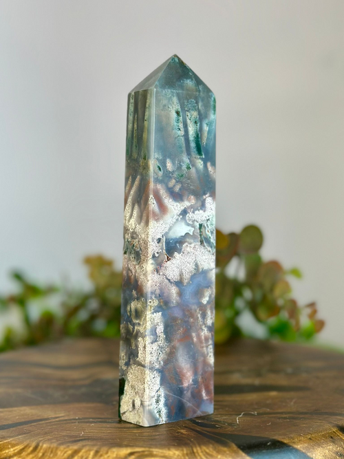 16cm Cosmic Sea Jasper crystal tower showing translucent scenic patterning