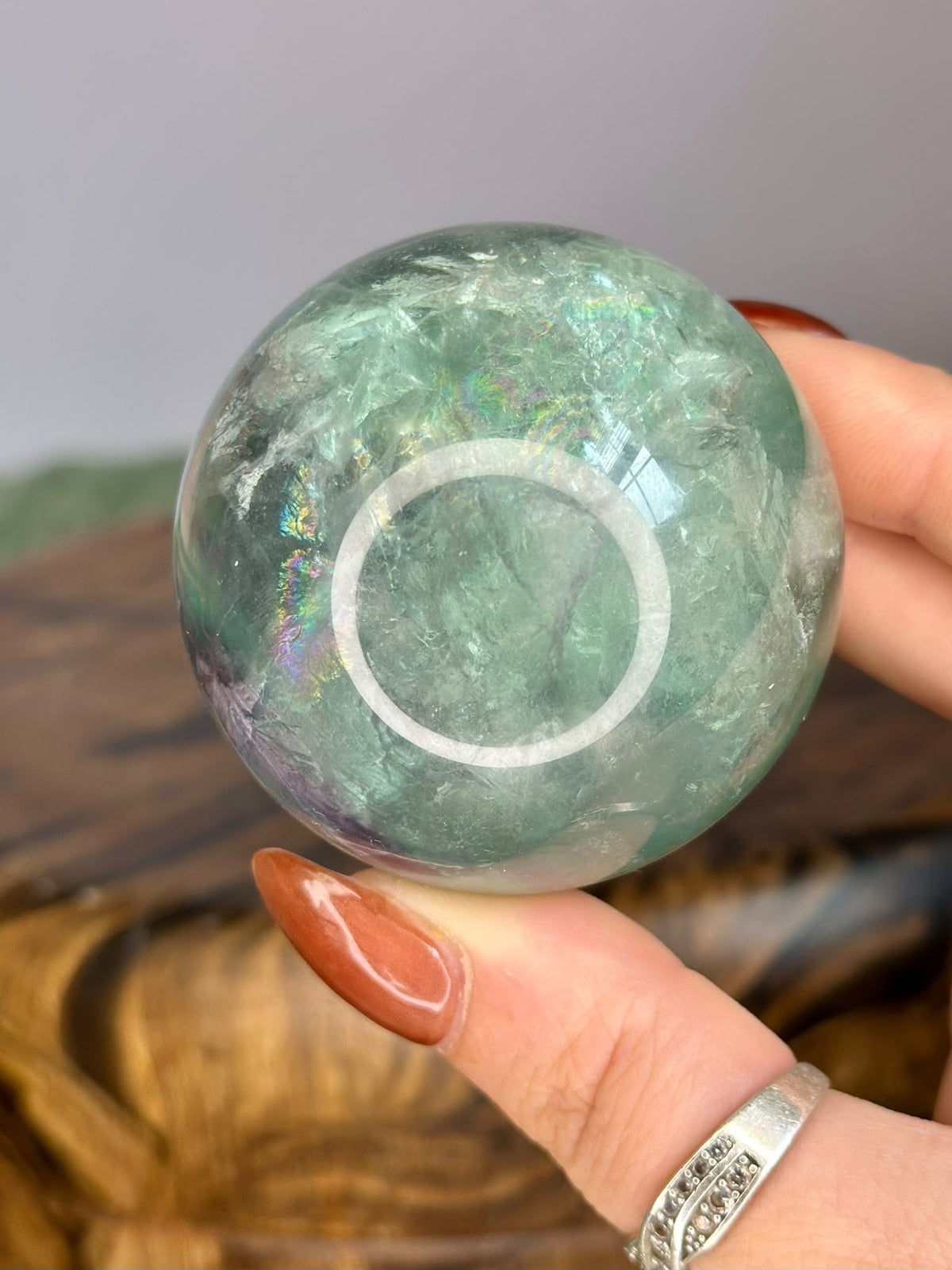 Green Fluorite sphere with natural rainbow inclusions, 283g polished crystal