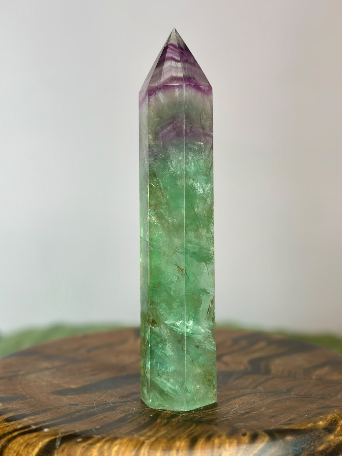 20cm Rainbow Fluorite crystal tower showing natural green and purple colour zoning