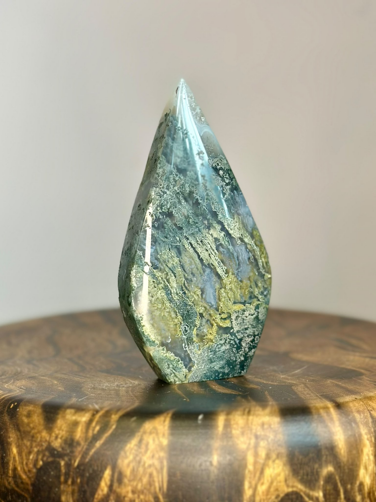 Reverse view of Moss Agate teardrop crystal with green, sage and grey-blue natural landscape patterns