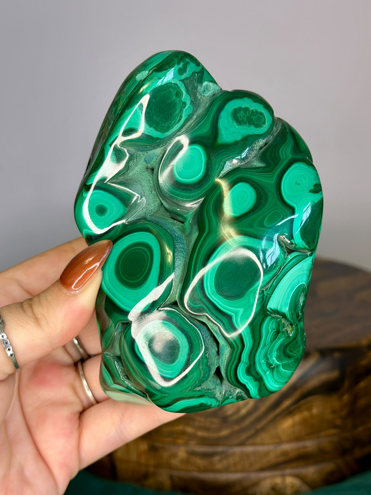 Large 13cm polished Malachite display specimen with circular green formations