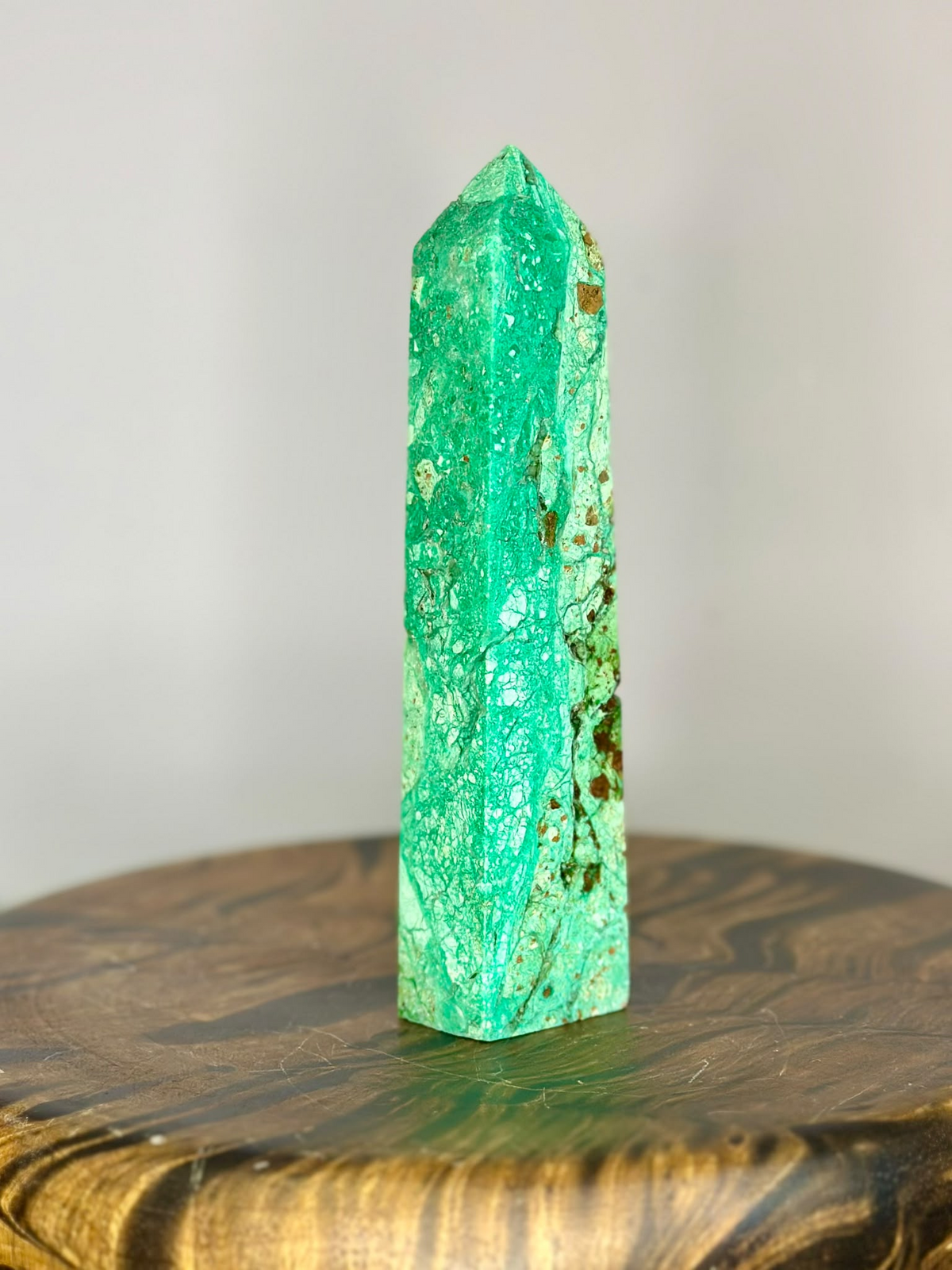 Back view of 17cm Pakistan Chrysoprase tower with green and brown natural inclusions