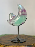 Rainbow Fluorite crescent moon on black metal stand with green and purple banding