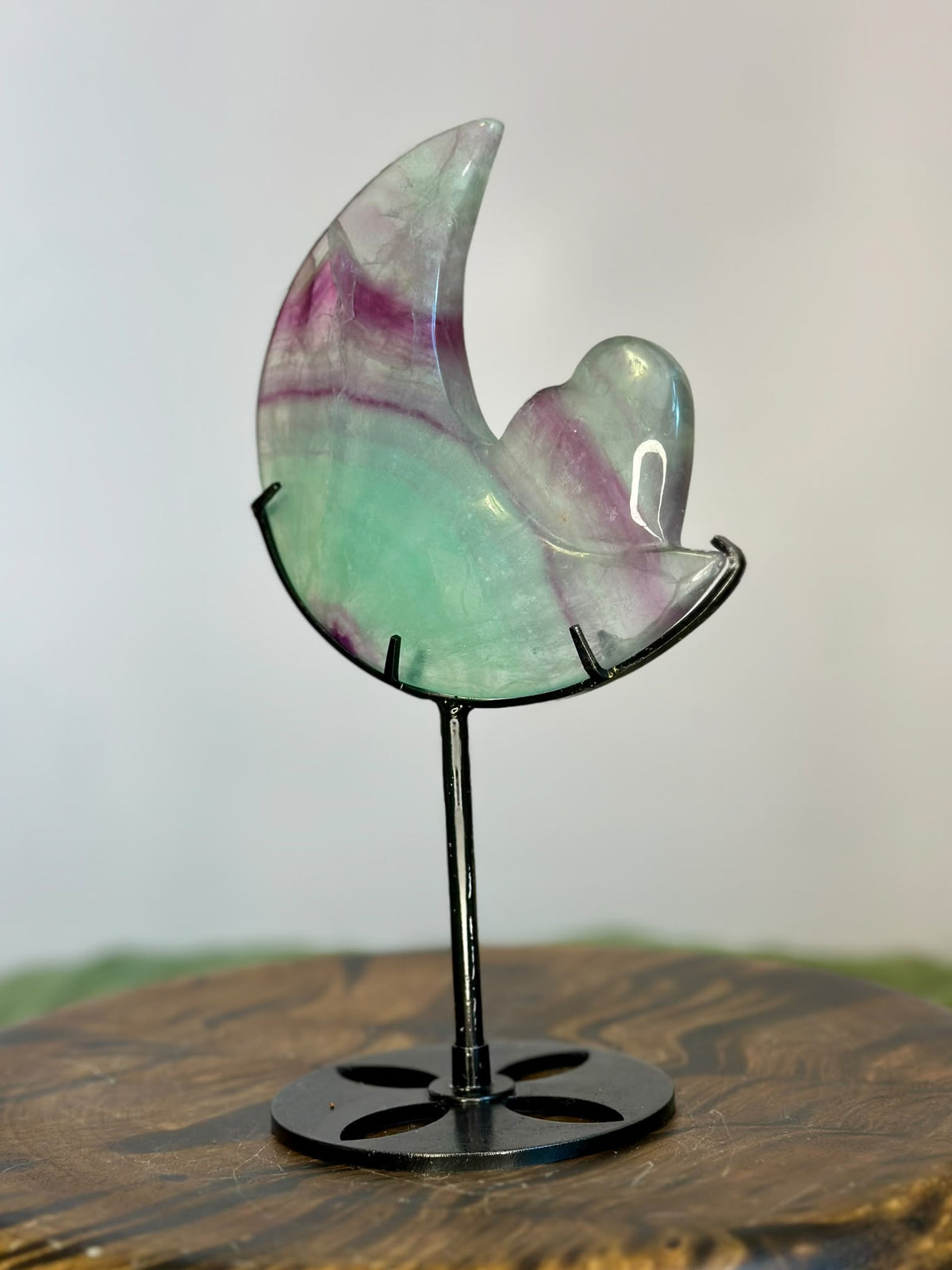 Reverse view of 20cm Rainbow Fluorite moon showing natural purple and green colour zoning